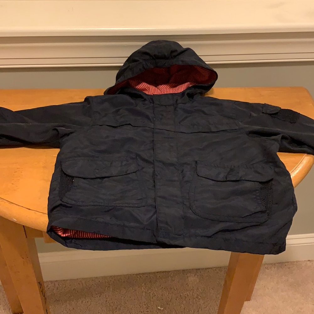 The children’s place, boy’s light jacket, size 24 months, black.